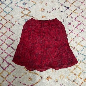 A 90’s low knee length skirt. Size 4 (if a 6 it MIGHT fit)